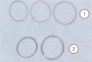 типы маслосъемных колец: 1 - состоящее из расширителя и двух колец, 2 - состоящее из расширителя и одного кольца